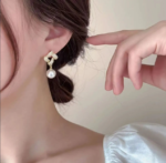 Gold Knot Pearl Drop Earrings - Image 4